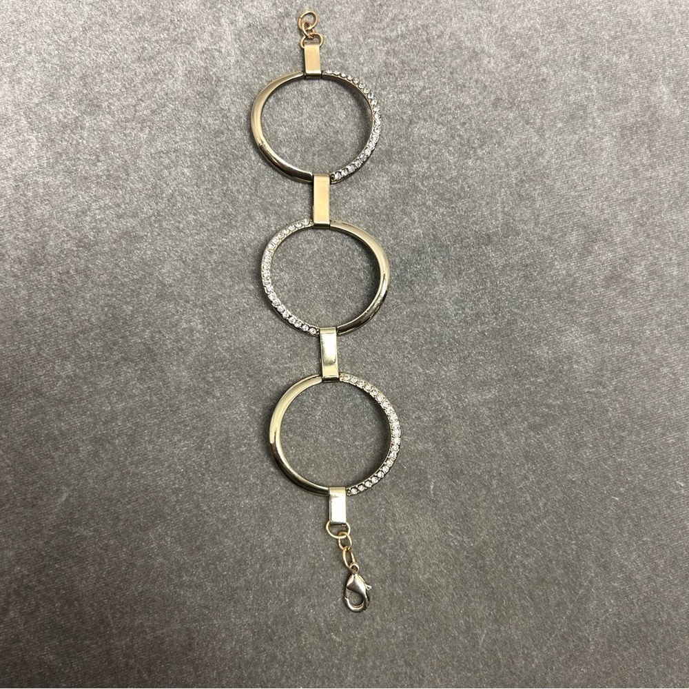 Guess gold-tone circular link crystal rhinestone bracelet